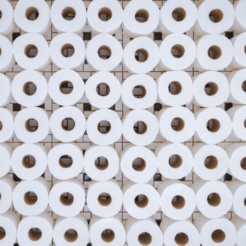 Rolls of toilet paper stacked and shot from above